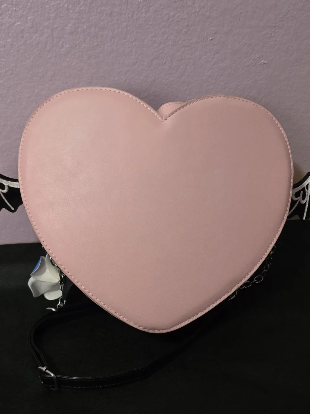 Heart-Shaped Pink Crossbody Bag with Gothic Ribbon Detail